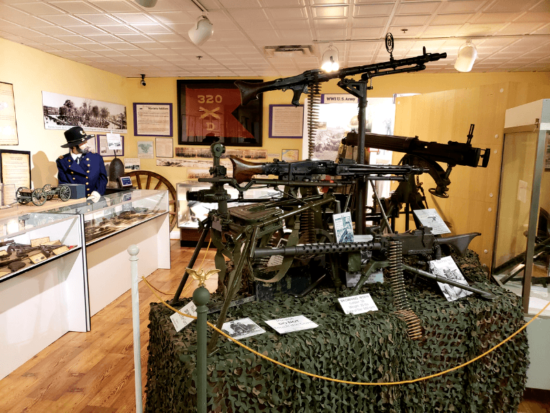 The Military Gallery has uniforms, guns, artifacts, and highlights local military members.