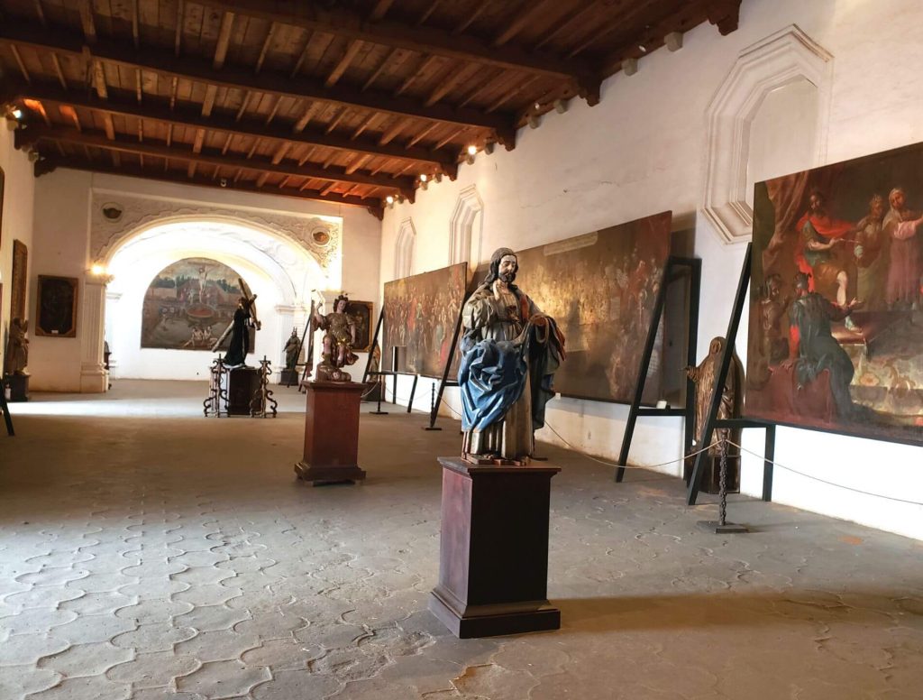 Some of the art pieces inside the Museo De Arte Colonial in Antigua, Guatemala